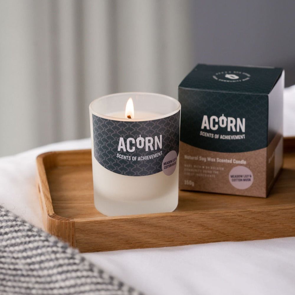 Meadow Lily and Cotton Musk scented soy wax candle in a jar