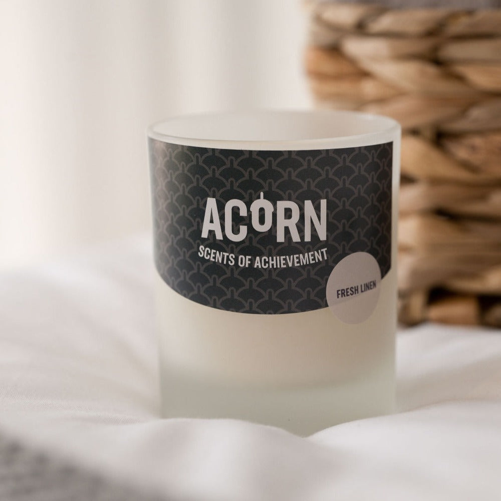 fresh linen scented soy wax candle in a jar
