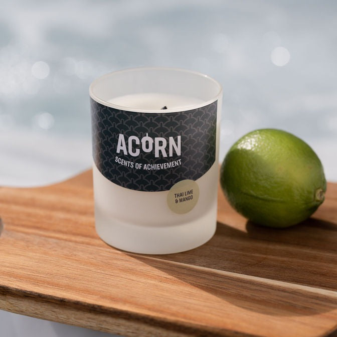 Thai Lime and Mango scented soy wax candle in a jar